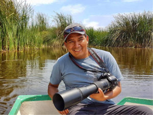 Moises loves taking photos of birds and animals in the jungle