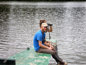 Travelers enjoying the nature in the reserve zone of the Manu National Park